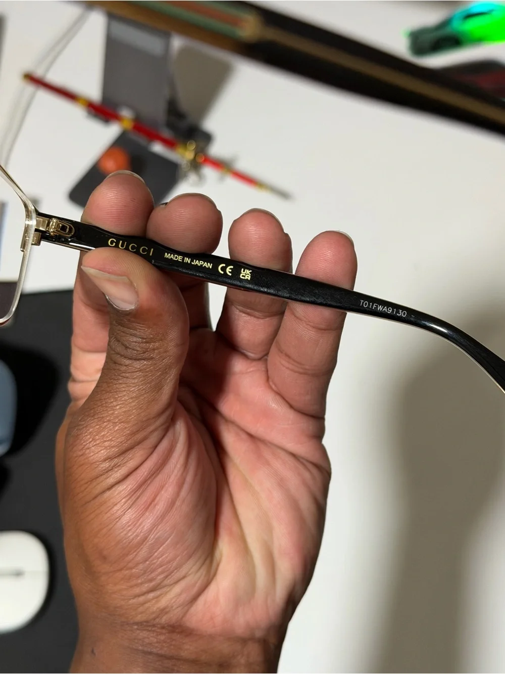 Gucci Men's Black and Gold Rimmed Eyeglasses